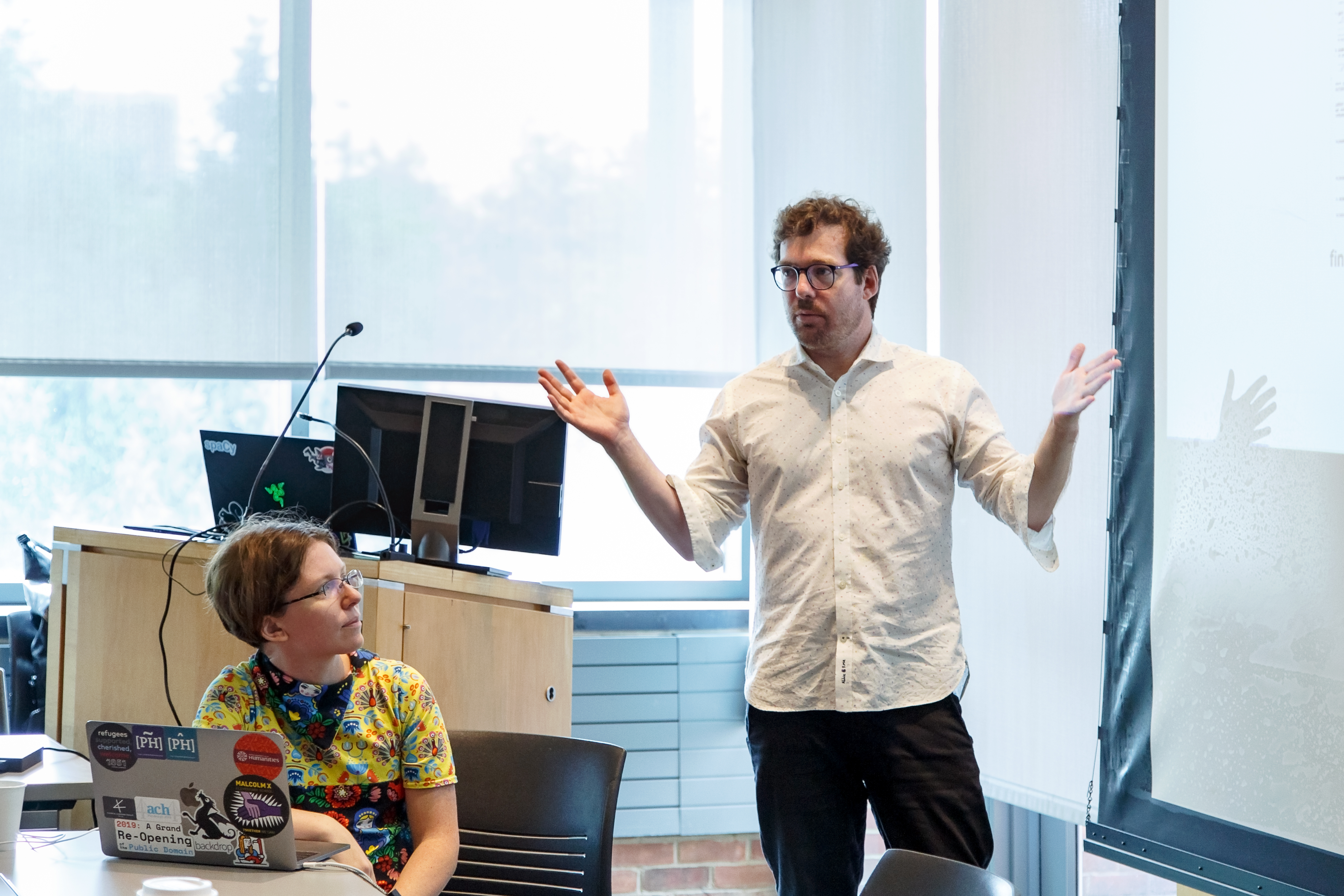 Photos of Institute instructor Quinn Dombrowski (Stanford University) and Project Co-Director Andrew Janco (Haverford College) teaching a course on computer vision at the 2019 Slavic DH Summer Workshop at Princeton. 